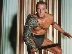 Kirk Douglas the slave Spartacus, ready to fight in a scene from the film 'Spartacus', 1960. (Photo by Universal Pictures)