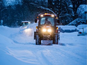 Snow removal contractors arrive to clear residents driveways after a significant snowfall in Ottawa. February 7, 2020.