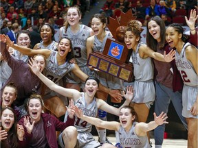 The Gee Gee's celebrate the win in the women's Capital Hoops Classic basketball game between the University of Ottawa and Carleton University.