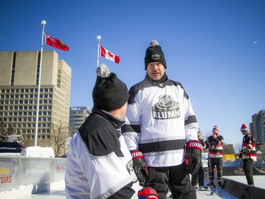 The Ottawa Senators Alumni and NHL Alumni held a shinny game at the Rink of Dreams in front of City Hall Saturday, February 8, 2020, part of the Home Town Hockey Tour. Shawn Rivers, right, chats with NHL Alumni teammate Bryan Richardson.