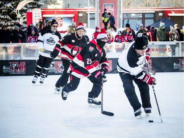 The Ottawa Senators Alumni and NHL Alumni held a shinny game at the Rink of Dreams in front of City Hall Saturday, February 8, 2020, part of the Home Town Hockey Tour. NHL Alumni Bryan Richardson brings the puck down the ice.   Ashley Fraser/Postmedia