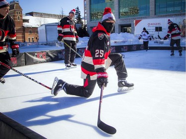 The Ottawa Senators Alumni and NHL Alumni held a shinny game at the Rink of Dreams in front of City Hall Saturday, February 8, 2020, part of the Home Town Hockey Tour. Chris Neil was dressed properly for the chilly temperatures Saturday.   Ashley Fraser/Postmedia
