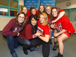 L-R, Angela Pitt, MLA for Airdrie-East and Leela Sharon Aheer, Minister of Culture, Multiculturalism and Status of Women along with the Zone 3 wrestling team from Calgary introduce AlbertaÕs first Ambassador for Sport and Active Living, Olympian Erica Wiebe at Muriel Clayton Middle School in Airdrie on Saturday, February 15, 2020. Darren Makowichuk/Postmedia