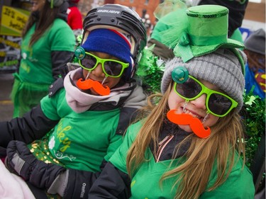 Eight-year-old Nayeli Djulus, left, and 11-year-old Mya Labelle take part in the bed race on Saturday.