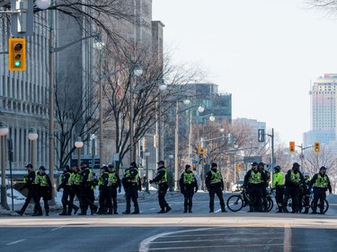 Parliamentary Protective Service officers line Wellington Street in preparation for the All Eyes on Parliament: Rally for the Wet'suwet'en in downtown Ottawa. February 24, 2020.