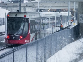 An idle LRT sits on the track slightly east of the St Laurent station due to a malfunction.