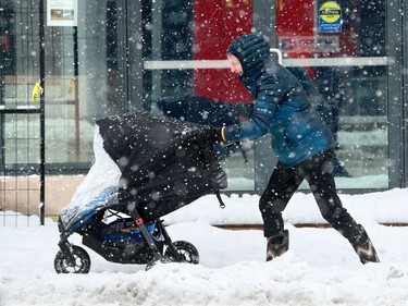 Commuters had a hard time getting around Ottawa Thursday following a huge dump of wet, slushy snow in the capital.