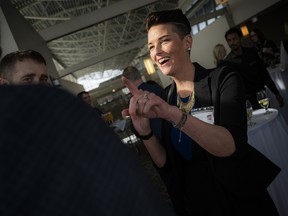 Kyla Cullain, chair of the WAMS sales cabinet and co-founder of BuildAble, chats with guests during the VIP reception.