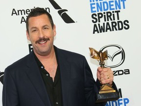 Winner of Best Male Lead for "Uncut Gems" US actor Adam Sandler poses in the press room during the 35th Film Independent Spirit Awards in Santa Monica, California, on February 8, 2020.