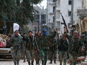 Members of the Syrian army deploy in the al-Rashidin 1 district, in Aleppo's southwestern countryside, on Sunday. - Syrian regime forces made new gains in their offensive against the last major rebel bastion in the northwest, seizing villages and towns around second city Aleppo, state media and a monitor said.