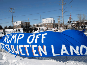 Supporters of the indigenous Wet'suwet'en Nation's hereditary chiefs at a railway blockade in St. Lambert, Que., Feb. 20, 2020.