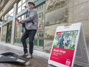 A busker performs in Calgary, where the city regulates busking, both on the street and on Calgary Transit. On Friday, OC Transpo provided an update on its O-Train Line 1 busking program, which will be implemented this spring.