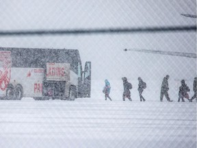 Canadians evacuated from China due to the outbreak of novel coronavirus, who had left Wuhan on an U.S. plane which then transferred them in Vancouver, arrive at Canadian Forces Base (CFB) Trenton in Trenton, Ontario, Canada February 7, 2020.