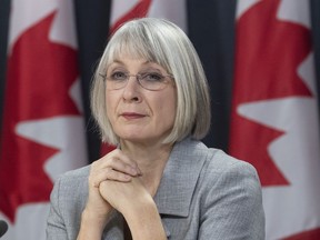 Minister of Health Patty Hajdu listens to a questions during press conference in Ottawa on February 3, 2020. The government has released its plan to improve health care and support for people who are affected by Post Traumatic Stress Disorder, a potentially serious mental condition that can take root when someone is exposed to a traumatic event.The plan, released today by Health Minister Patty Hajdu, charts a path forward for how the government approaches occupational PTSD, considering supports can vary province to province and workplace to workplace.