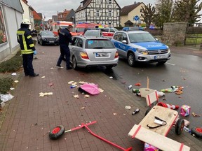 People react at the scene after a car ploughed into a carnival parade injuring several people in Volkmarsen, Germany February 24, 2020.