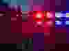 Red and blue Lights of police car in night time.