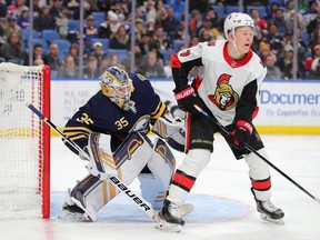 Ottawa Senators left wing Brady Tkachuk looks for the puck as he screens Buffalo Sabres goaltender Linus Ullmark during the third period at KeyBank Center, Jan. 28, 2020.