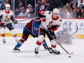 Ottawa Senators right wing Tyler Ennis controls the puck against Colorado Avalanche right wing Joonas Donskoi in the first period at the Pepsi Center on Tuesday.