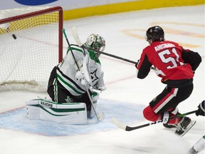 Ottawa Senators center Artem Anisimov scores against Dallas Stars goalie Anton Khudobin in overtime at the Canadian Tire Centre on Sunday.