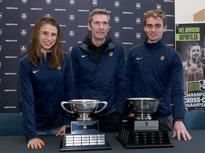 Queen's Gaels cross-country coach Steve Boyd, centre, was fired by the university this week. (Ian MacAlpine/The Whig-Standard)