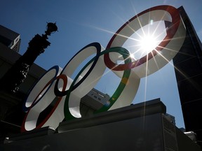 Summer sunshine is seen through Olympic rings displayed at Nihonbashi district in Tokyo, Japan August 5, 2019. (REUTERS/Issei Kato/File Photo)