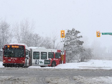 OC Transpo bus stuck in the snow on St. Laurent Blvd. in Ottawa Thursday Feb 27, 2020.