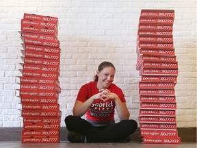 Pro pizza box maker Breanna Gray poses for a photo at Gabriel Pizza in Ottawa Ontario Wednesday Sept 30, 2015.