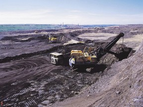 Files: An open-pit oil operation in the oilsands.