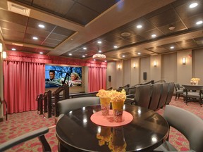 Residents of The Bradley enjoy a wide range of amenities including the on-site movie theatre, complete with popcorn.