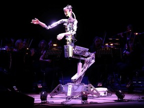 A robot maestro leads an orchestra at the Sharjah Performing Arts Academy in Sharjah, UAE, January 31, 2020. Picture taken January 31, 2020.