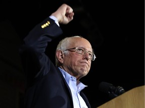 U.S. Democratic presidential candidate Senator Bernie Sanders pumps his fist as he speaks to supporters about being declared the winner of the Nevada Democratic Caucus during a campaign rally in San Antonio, Texas, on Feb. 22, 2020.