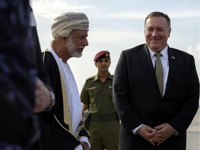 U.S. Secretary of State Mike Pompeo is greeted by Oman's Foreign Minister Yusuf bin Alawi bin Abdullah at the tarmac upon his arrival in Muscat, Oman February 21, 2020.