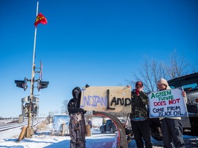 First Nations members of the Tyendinaga Mohawk Territory block train tracks servicing Via Rail, as part of a protest against British Columbia's Coastal GasLink pipeline, in Belleville, Ontario, Canada February 8, 2020.