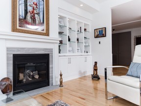 Fireplaces and built-in shelving units add a touch of class to any living room or den.