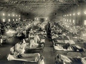 Influenza victims crowd into an emergency hospital near Fort Riley, Kansas in this 1918 photo.