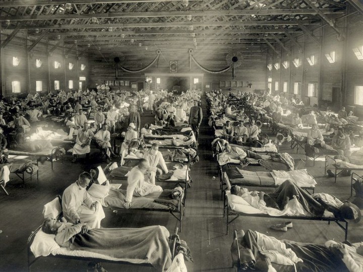  Influenza victims crowd into an emergency hospital near Fort Riley, Kansas in this 1918 photo.