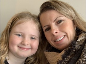 Suzanne Westover and her daughter, Elise Ravesloot, 8, are figuring out how to live with social constraints these days.