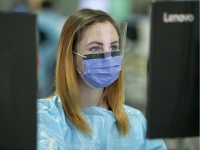 A nurse at Brewer Arena.