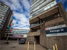 Place du Portage III in Gatineau will welcome some of the more than 200 volunteers who will be returning to work Tuesday.