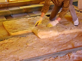 The wooden joists visible between sections of insulation are the only place that can bear weigh in a typical attic. Joist location can be harder to see as insulation depth rises.