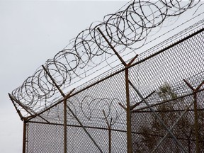 Barbed wire tops the fences of the Ottawa Carleton Detention Centre.