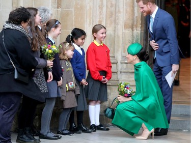 LONDON, ENGLAND - MARCH 09: Meghan, Duchess of Sussex and Prince Harry, Duke of Sussex speak to young wellwishers as they depart the Commonwealth Day Service 2020 at Westminster Abbey on March 09, 2020 in London, England. The Commonwealth represents 2.4 billion people and 54 countries, working in collaboration towards shared economic, environmental, social and democratic goals.