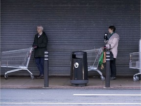 Senior citizens queue to shop at Sainsbury's Supermarket on March 19, 2020 in Northwich, United Kingdom. A queue of approximately 600 old age pensioners formed before the market opened at 7am as the shop opened specially for the elderly. After spates of "panic buying" cleared supermarket shelves of items like toilet paper and cleaning products, stores across the UK have introduced limits on purchases during the COVID-19 pandemic. Some have also created special time slots for the elderly and other shoppers vulnerable to the new coronavirus.