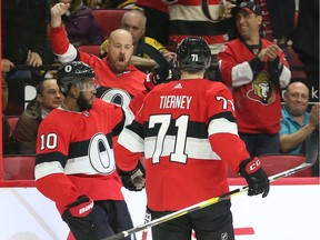 Ottawa Senators fans celebrate along with Chris Tierney and Anthony Duclair.