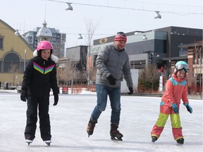 The Merkel family skates on the outdoor skating rink at Lansdowne Park March 18.