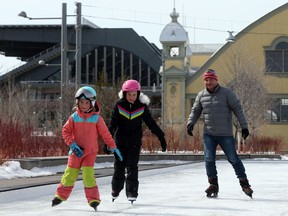 The Merkel family skate on the outdoor skating rink at Lansdowne Park in Ottawa, March 18, 2020. Photo by Jean Levac/Postmedia News assignment 133462 133462