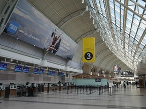 An almost-empty Terminal 3 is shown at Pearson International Airport in Toronto, Friday, March 13, 2020.