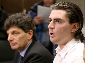 Former University of Ottawa hockey player Andrew Creppin, right, with criminal lawyer Lawrence Greenspon. when the lawsuit was announced in January 2015.
