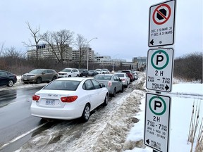 Signs indicate a no stopping zone along Lynda Lane near the Ottawa Hospital General Campus.