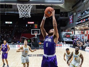 Eriq Jenkins of the Western Mustangs lays the ball in the basket for two points in a U Sports Final 8 men's basketball quarterfinal against the Alberta Golden Bears at the arena at TD Place in Ottawa on Friday, March 6, 2020. Western won the game 86-72.